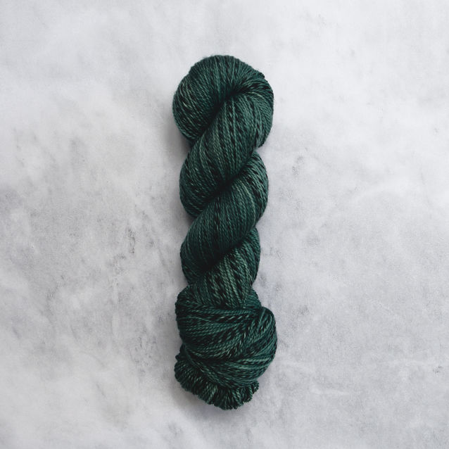 Dark green skein of yarn with black stripes.