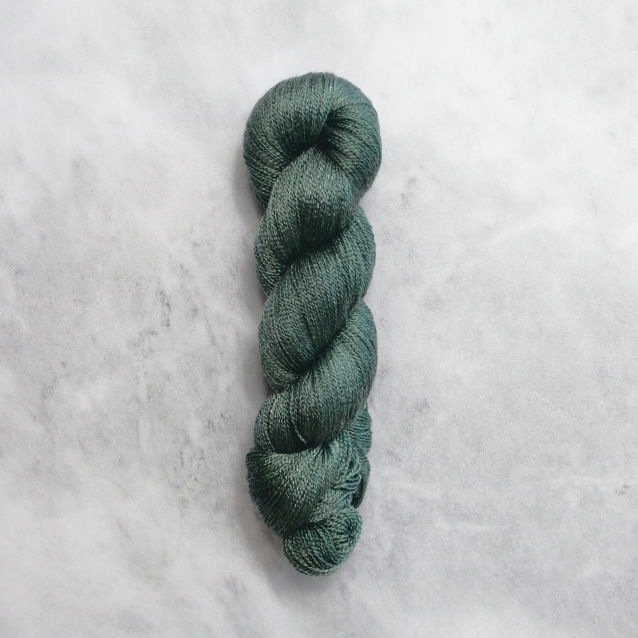 Dark green skein of yarn with silver shimmer.