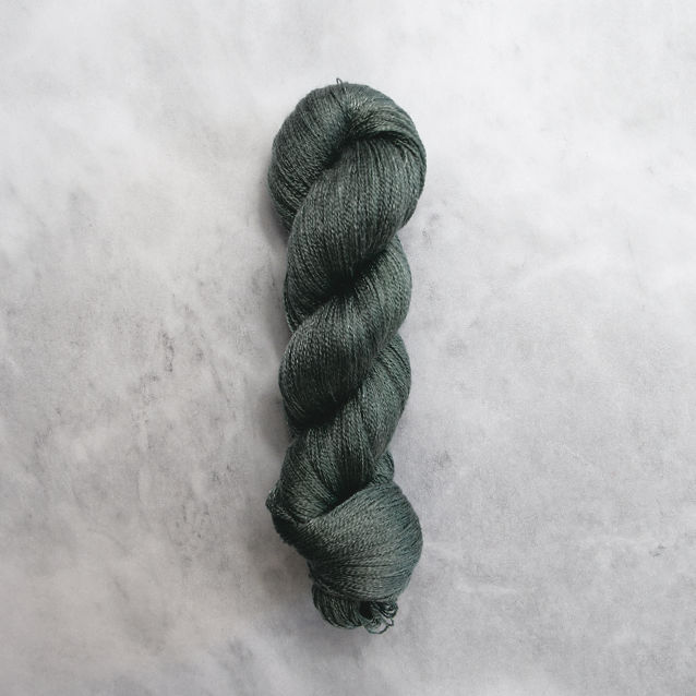 Dark grey-green skein of yarn with silver shimmer.